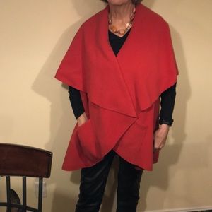 Poncho type jacket in a beautiful red. Worn once